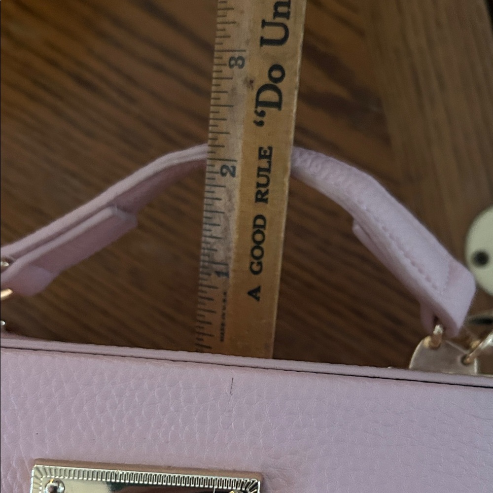 Tommy Bahama Wicker & Pink
Faux Leather Crossbody - Picture 10 of 15